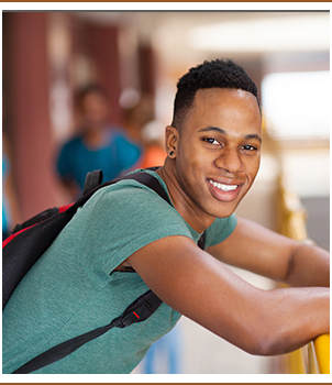 Smiling student wearing a backpack